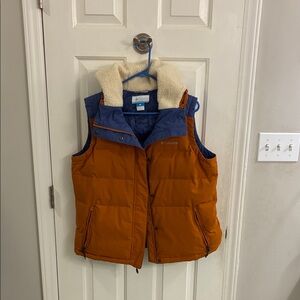 Columbia women’s down vest in harvest gold/blue with sherpa lined hood, XL